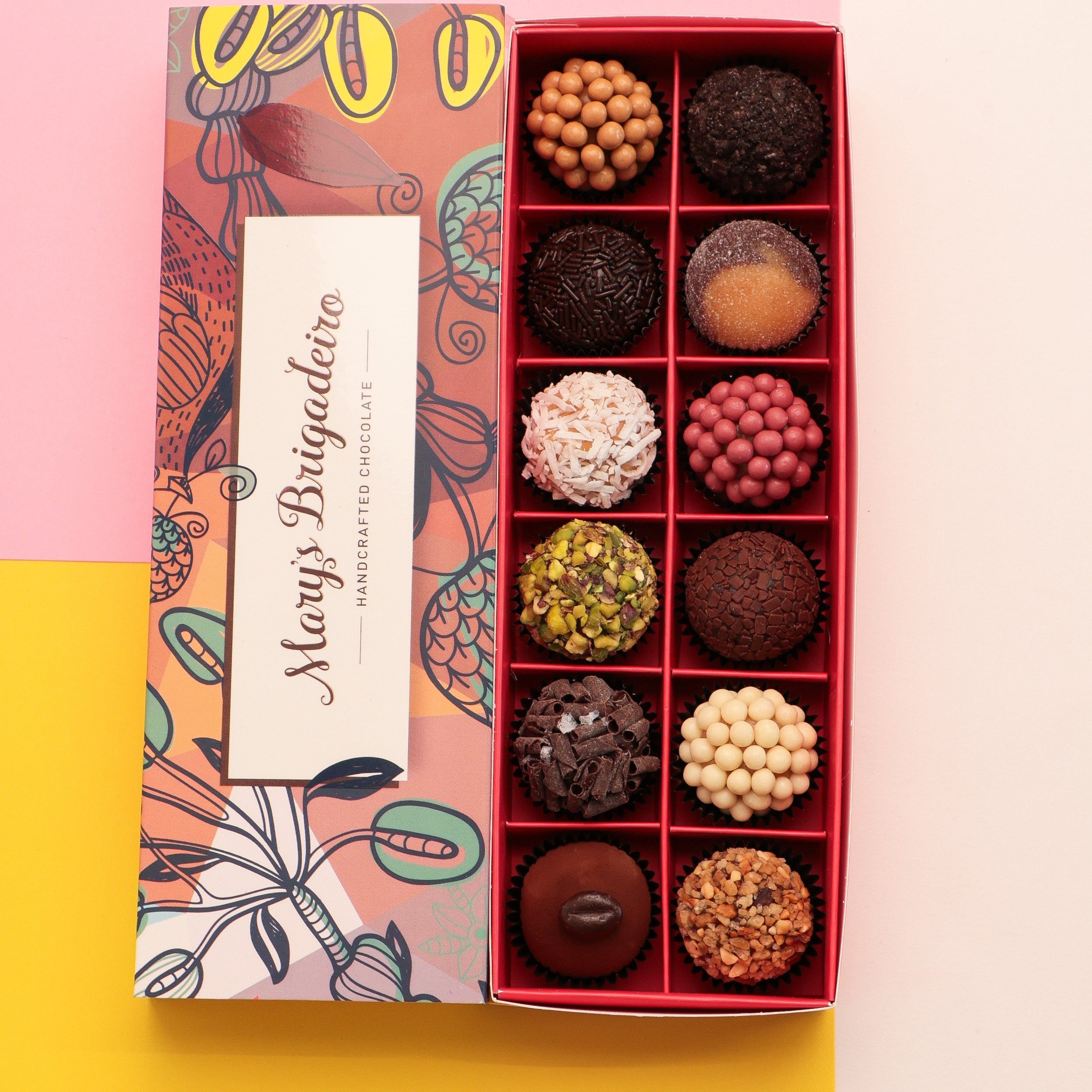 Box of assorted 12 pieces Brigadeiro chocolates with a decorative box on a colorful background