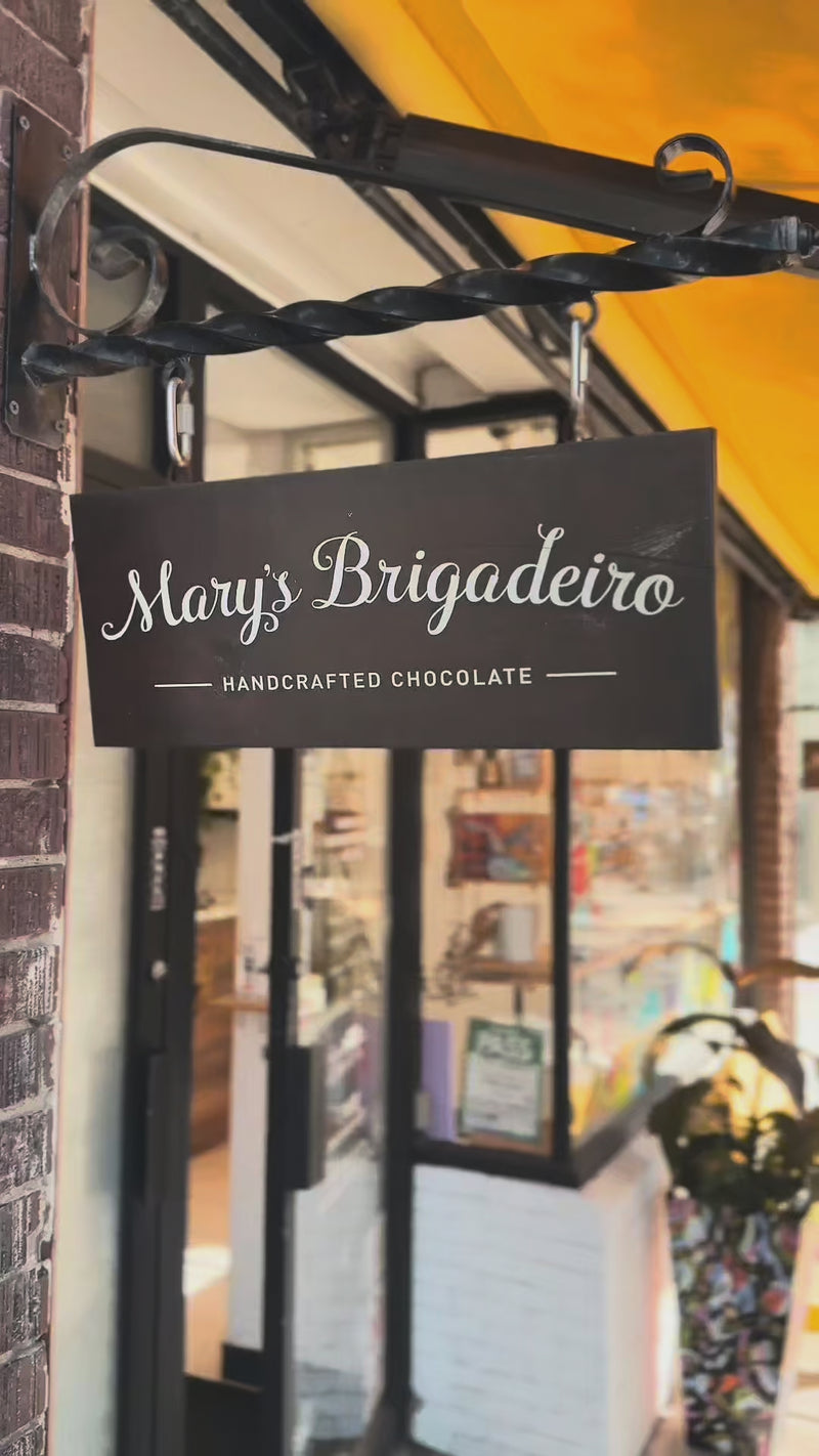 Mary's Brigadeiro stores and the team producing chocolate brigadeiros